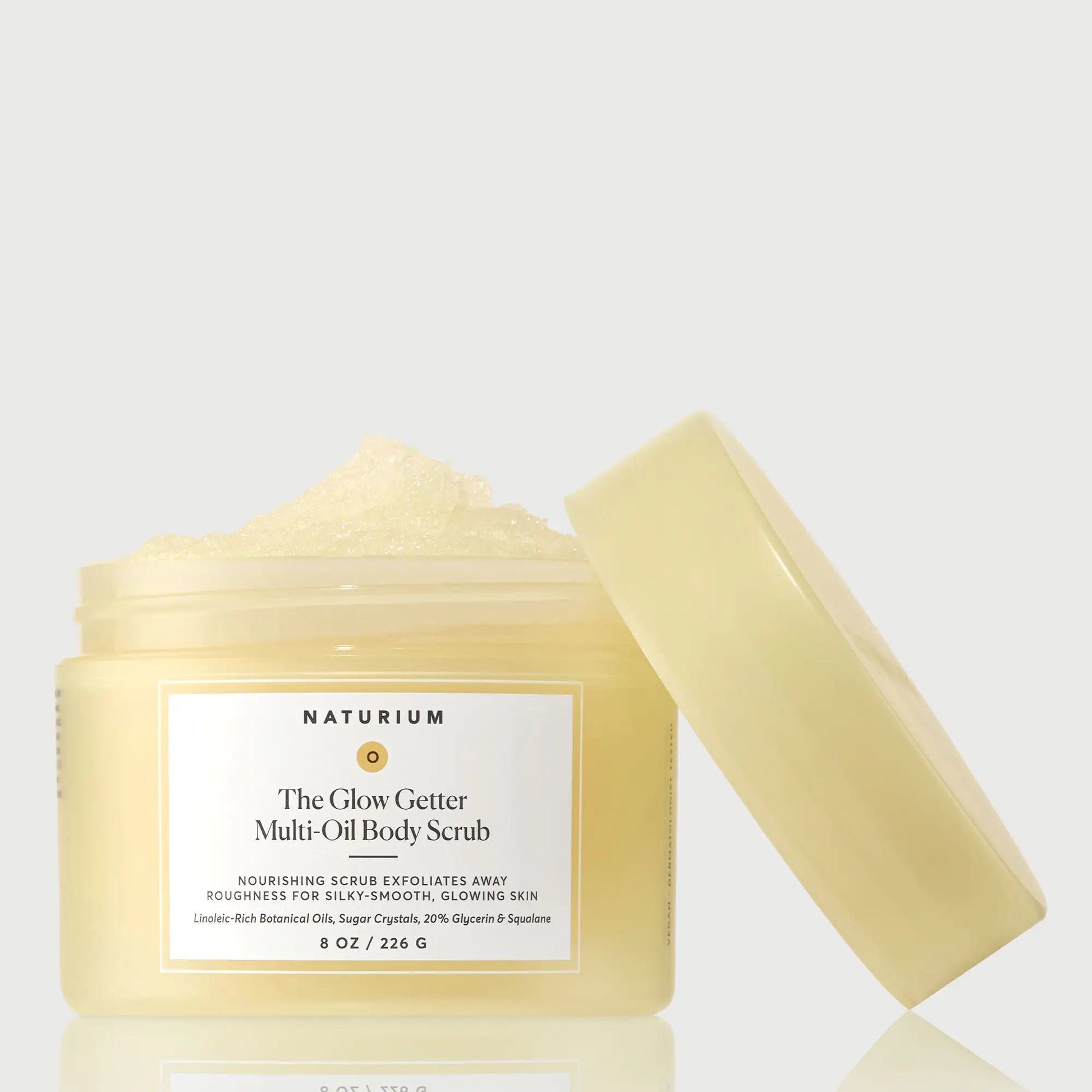the-glow-getter-multi-oil-body-scrub-w6 NATR-40028-GlowGetter-Multi-Oil-Body-Scrub-Front-CapOff-bonebkgd.webp