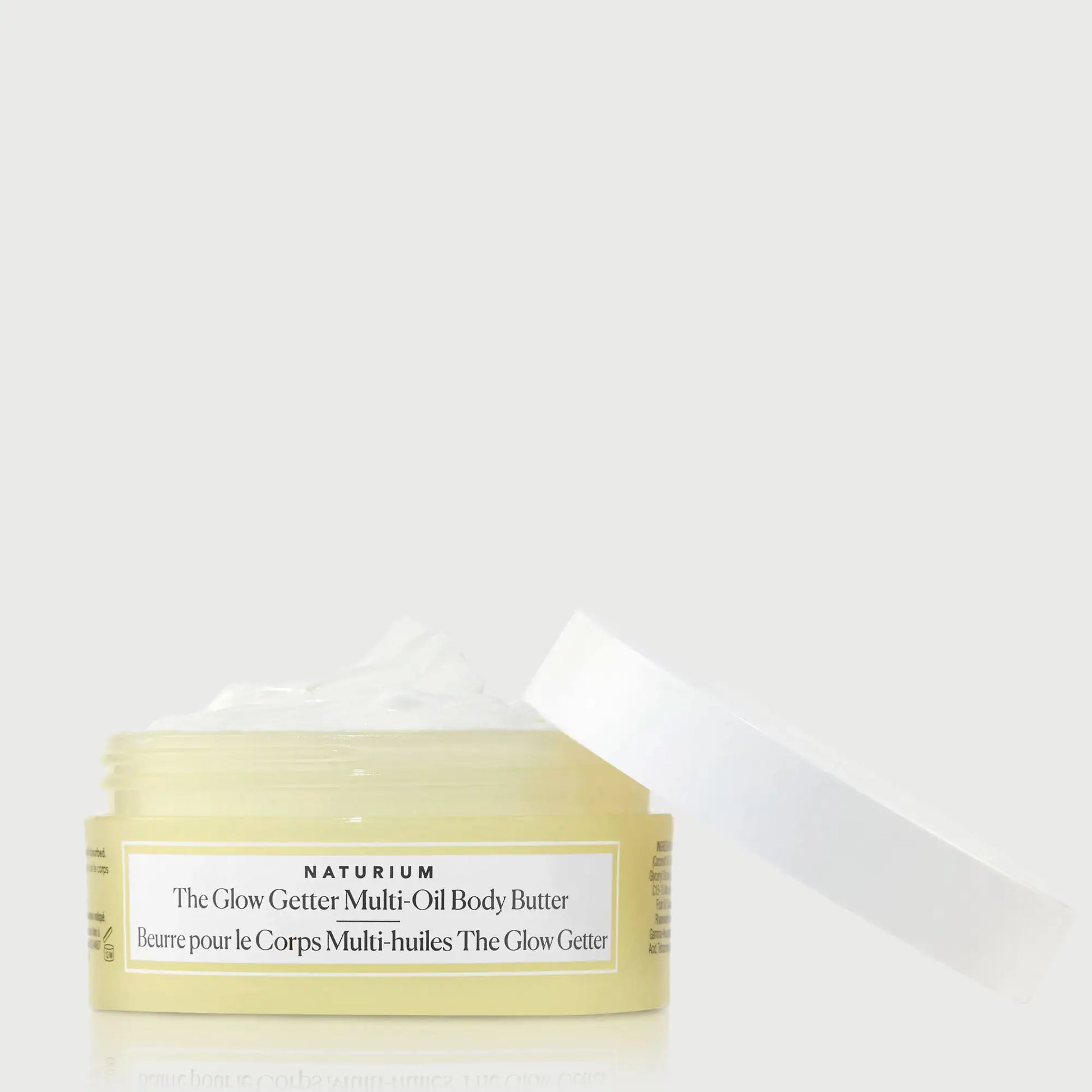 the-glow-getter-multi-oil-body-butter-travel-size-o3 NATR-40115_Glow-Getter-Body-Butter-Mini_front_capoff_bonebkgd.webp