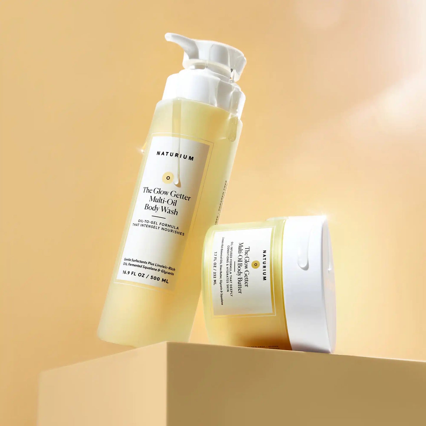 the-glow-all-out-body-bundle-l8 gg-bodybutter_1464-crop_revcolor_FL.webp